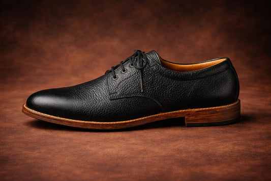Black leather dress shoe on a brown backgroundBlack Ronin Premium Black Leather Derby Shoes for Men - Kyoto Boots