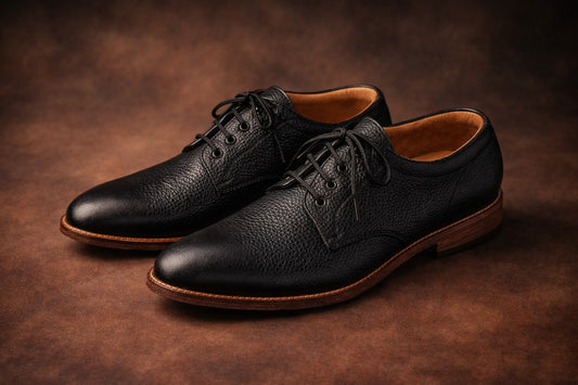 Pair of black leather shoes on a brown background Black Ronin Premium Black Leather Derby Shoes for Men - Kyoto Boots